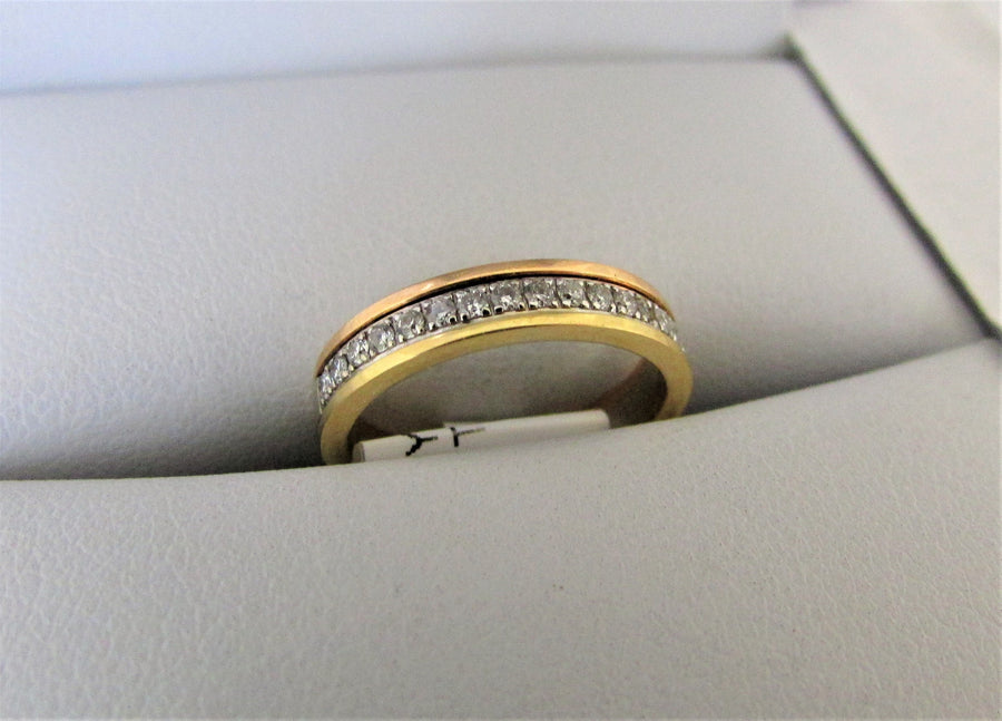 B1623 - 18 Karat White, Yellow, and Rose Gold Band