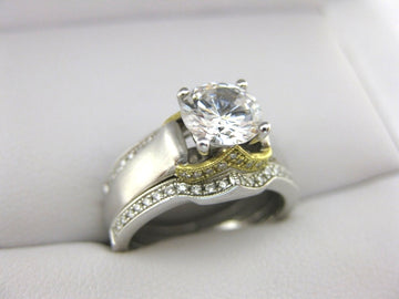 A1950 - 18 Karat White Gold Simon G. Engagement Ring and Bands