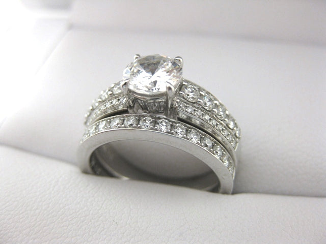 A1953 - 18 Karat White Gold Simon G. Engagement Ring and Band