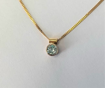 TSI0013 - 14 Karat White and Yellow Gold Pendant